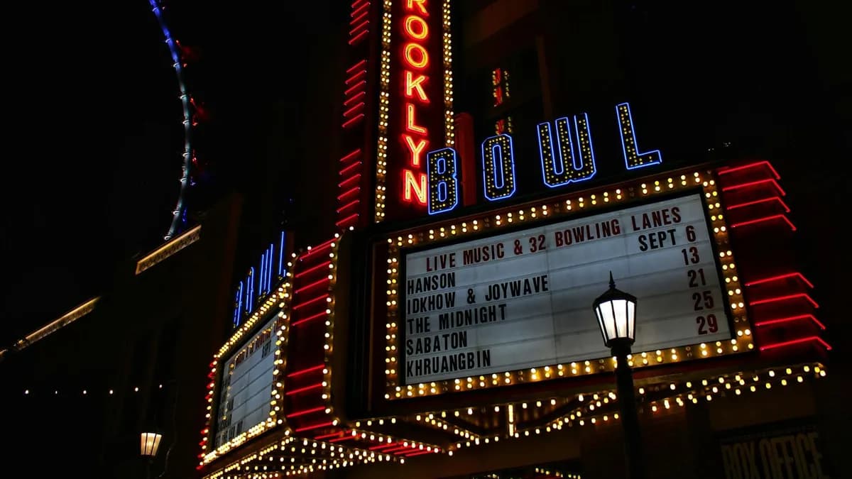 Neon-lit marquee of Brooklyn Bowl in Las Vegas, showcasing upcoming events.