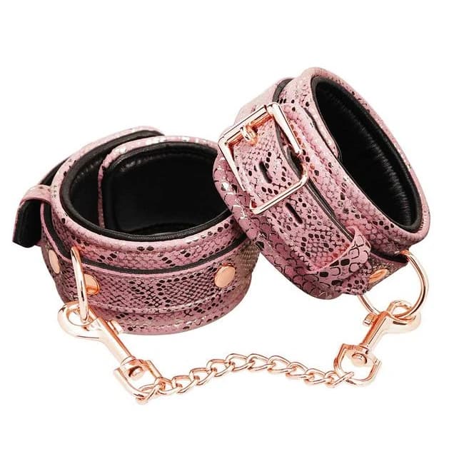 Microfiber Snake Print Wrist Restraints Pink W Leather Lining - Image 1 Microfiber Snake Print Wrist Restraints Pink W Leather Lining - Image 1