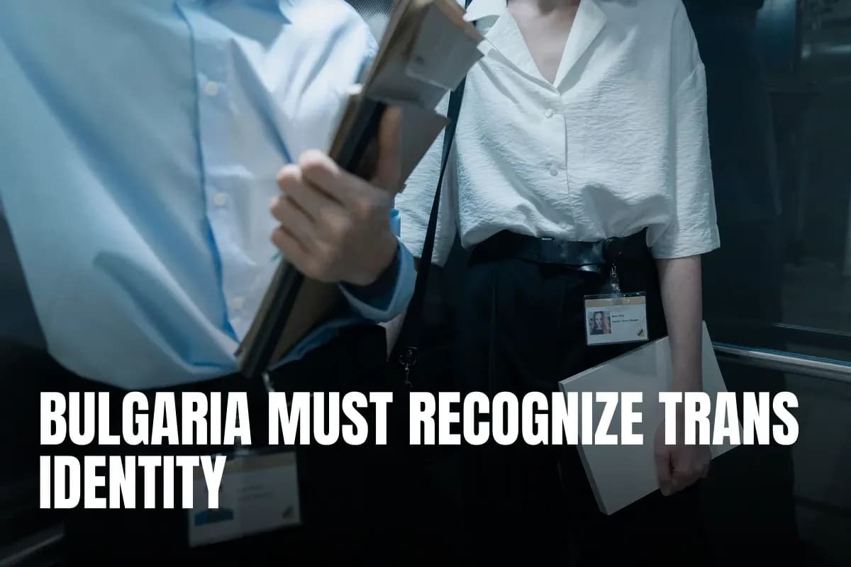 Two professionals in an elevator carrying documents, showcasing office attire.