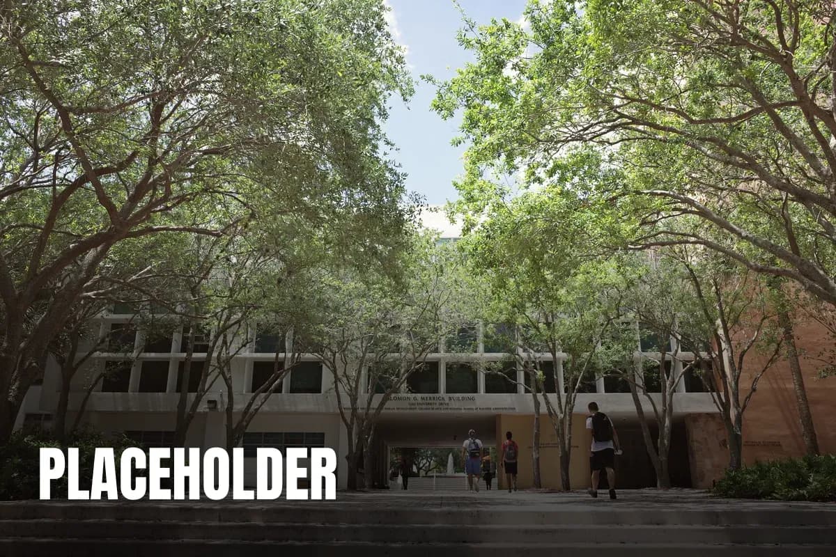 University campus in Coral Gables, Florida, with students walking under a sunny sky.