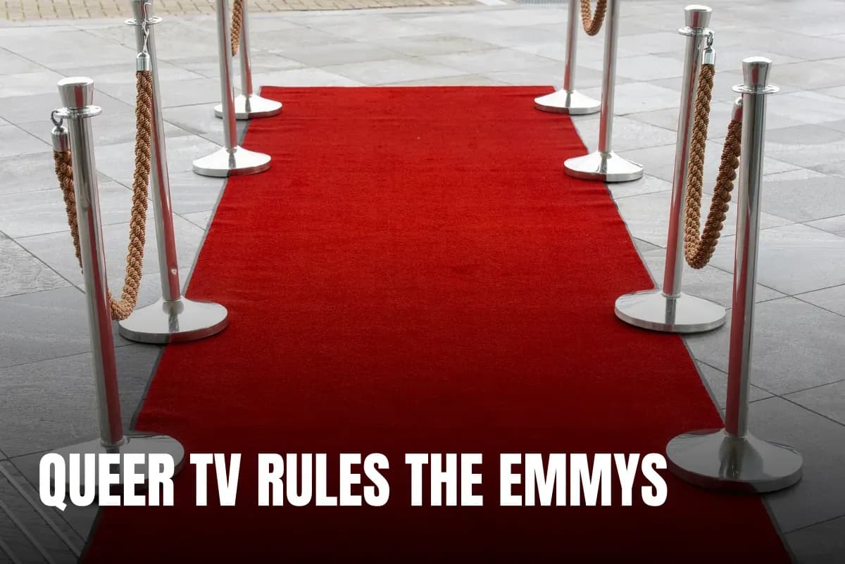 Red carpet entrance with stanchions on a tiled outdoor surface, perfect for events.