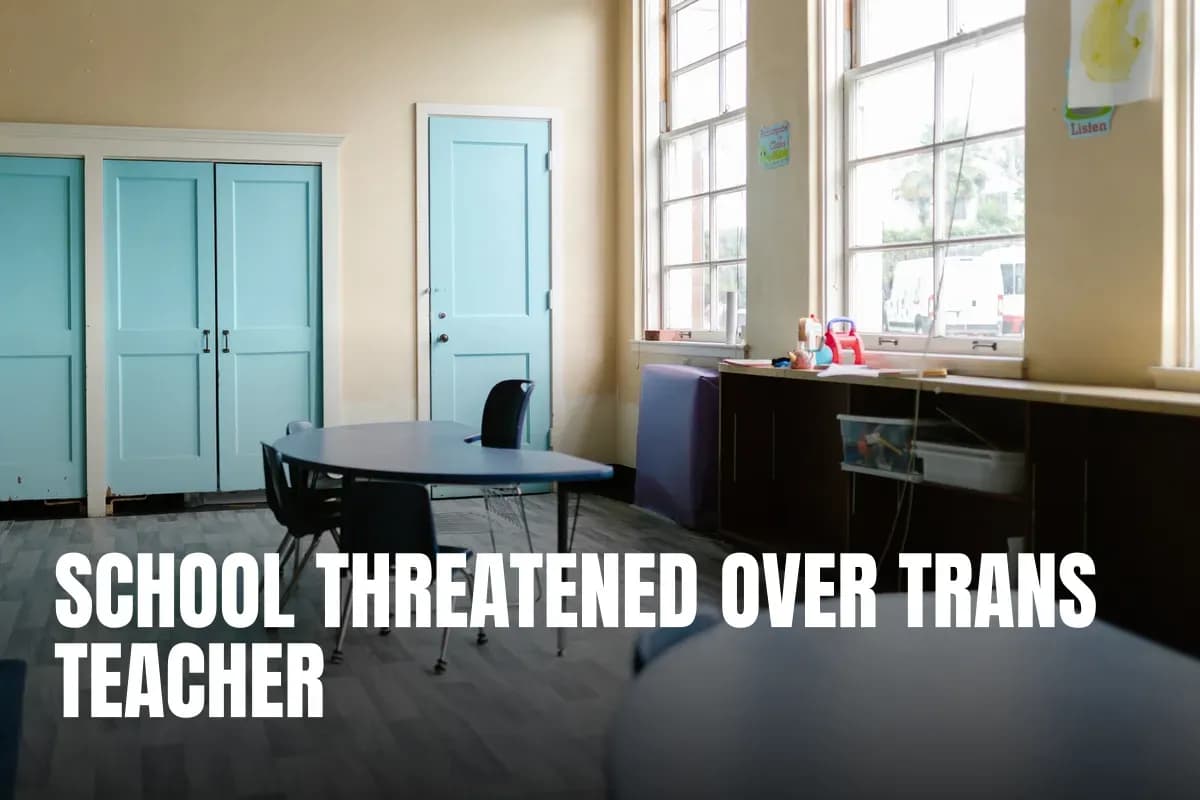 A well-lit empty classroom with blue doors and desks, ideal for education themes.